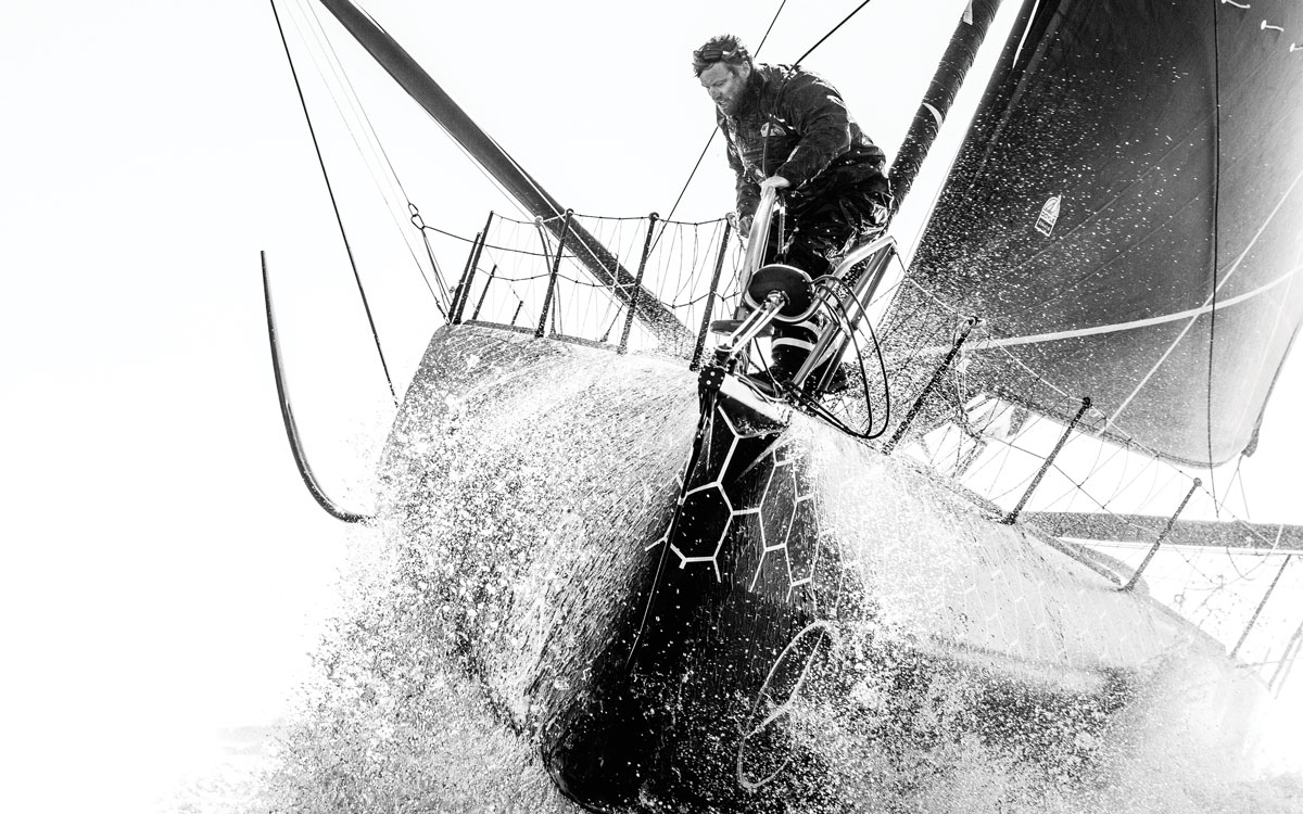 Alex-Thomson-profile-sailing-hugo-boss-bow-credit-lloyd-images